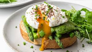 Toast with avacado and poached eggs Image